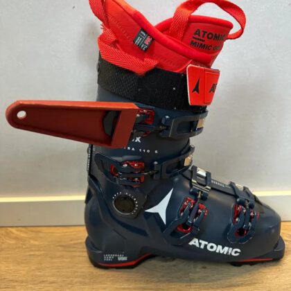 Ski boot tensioner
